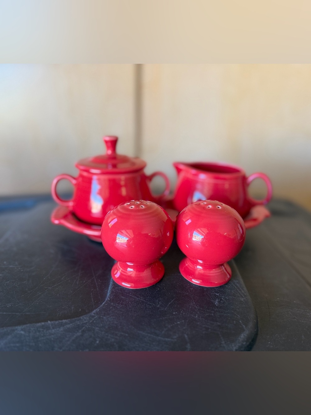 Red Ceramic Sugar and Creamer Set with Serving Tray and Salt and pepper set.